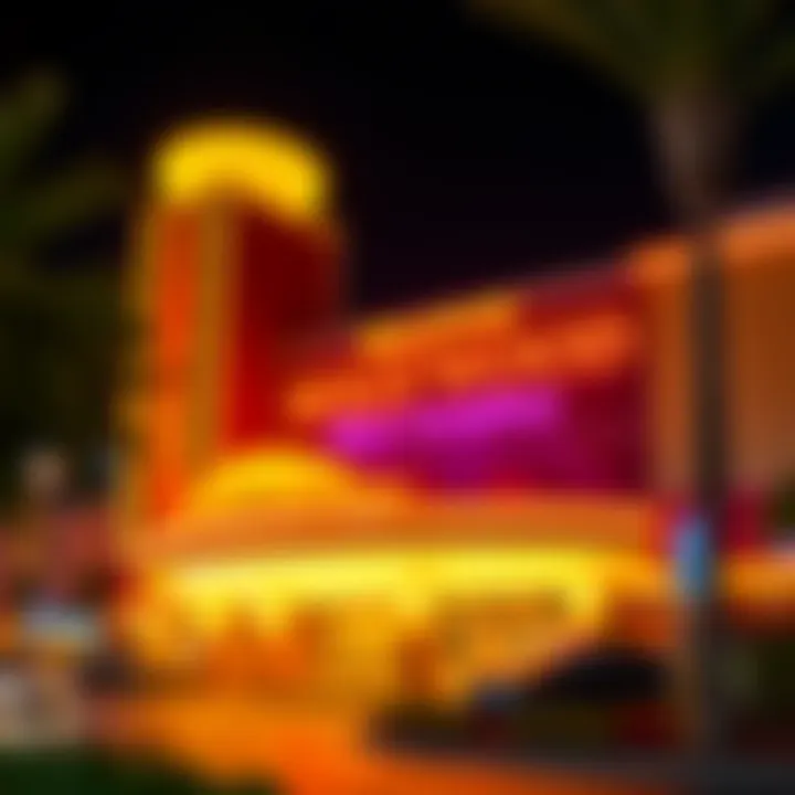 Exterior view of Hollywood Casino at Penn National illuminated at night with vibrant lights